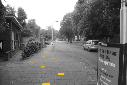 ...the path became a Yellow Brick Road, calling for pedestrians to enter the site